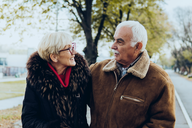Older couple walking winter
