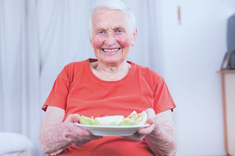 Older woman eating healthy food