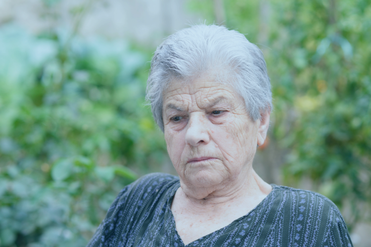Older woman looking worried