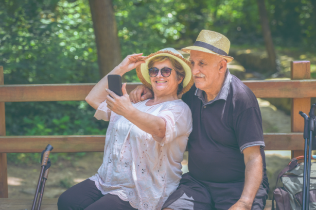 Healthy Hips Knees Aging Healthy older couple hiking taking selfie