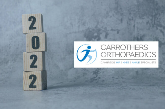 2022 written on dice with Carrothers Orthopaedics logo