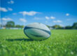 Close up of rugby ball on pitch