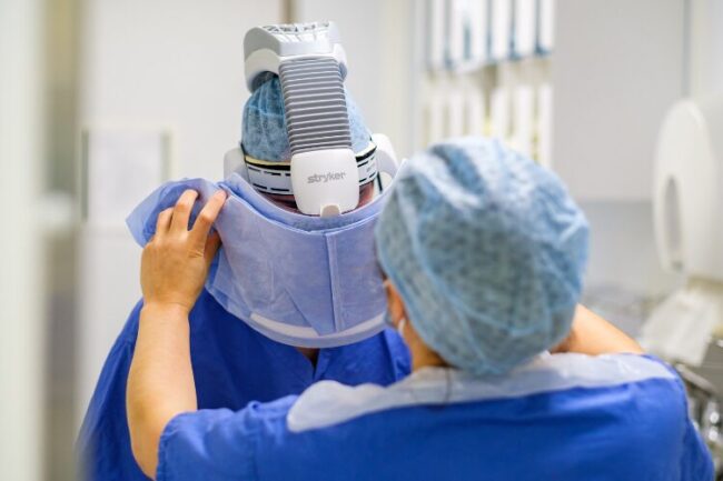 Mr Andrew Carrothers, orthopaedic surgeon in Cambridge, preparing for Mako robotic assisted total knee replacement surgery