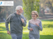 Middle aged couple jogging in the park
