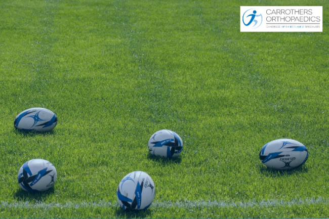 Rugby balls on a pitch