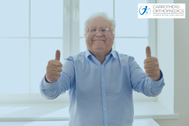 Older man with thumbs up