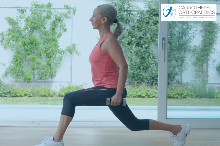 Middle age woman doing lunges with small hand weights