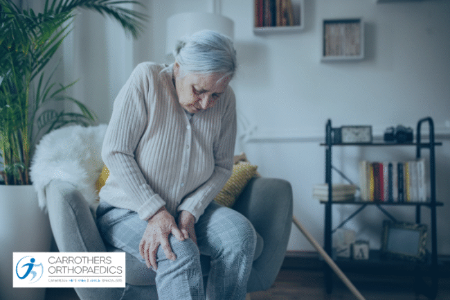 Impact of Osteoporosis on Knee Replacement Surgery Older woman holding knee in armchair