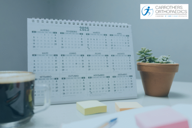 2025 Review – Looking Forward to 2026 Calendar of 2025 on desk with plant, coffee and post it notes