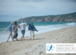 Older people walking on the beach
