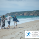 Older people walking on the beach