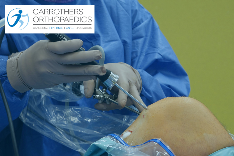 Surgeon performing knee surgery